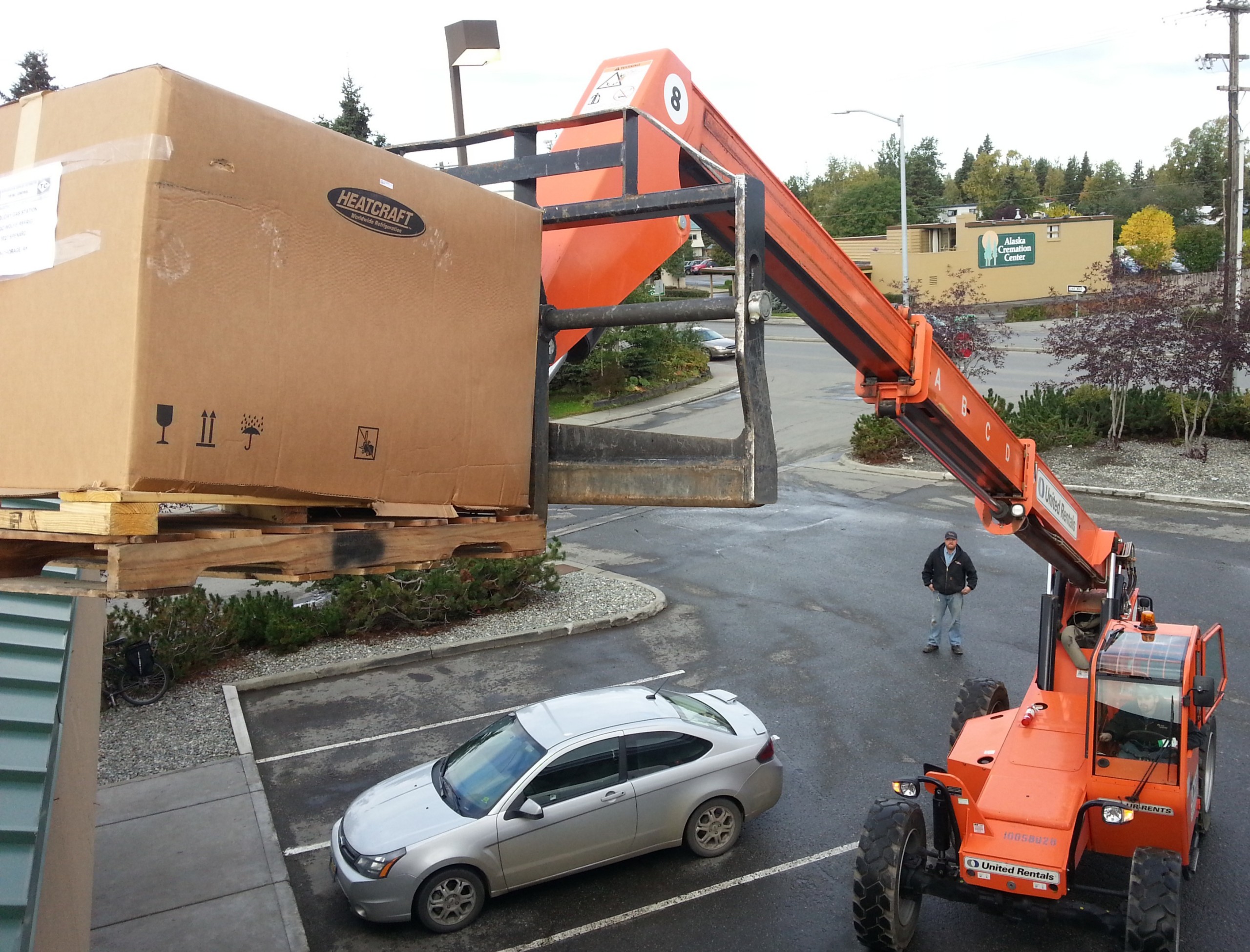 Large equipment installation with crane